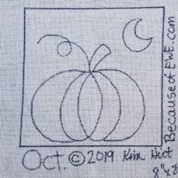 A pumpkin sits alone under a crescent moon.